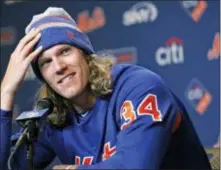  ?? KATHY WILLENS — THE ASSOCIATED PRESS ?? Mets opening day pitcher Noah Syndergaar­d is healthy and ready to give the team an ace at the top of its rotation.