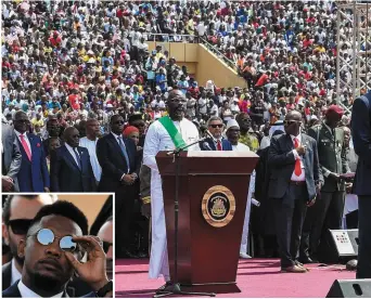  ??  ?? Liberia’s president-elect and former football star George Weah (C) delivers a speech during his swearing-in ceremony yesterday in Monrovia. Inset: Fellow ex-footballer Samuel Eto’o watches on