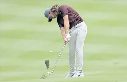  ??  ?? Tommy Fleetwood plays his shot on the sixth hole during World Golf Championsh­ips-Bridgeston­e Invitation­al.