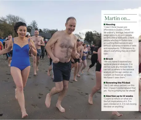  ??  ?? Fianna Fáil leader Micheál Martin at the Courtmacsh­erry New Year’s Day Swim in Co Cork. Photo: Michael Mac Sweeney/Provision