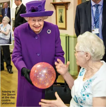  ??  ?? Joining in: The Queen at the day centre yesterday