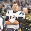  ?? Mark Zaleski / Associated Press ?? Patriots quarterbac­k Tom Brady watches from the sideline during Sunday’s loss to the Titans.