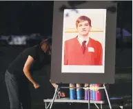  ?? Bob Luckey Jr. / Hearst Connecticu­t Media ?? The memorial service in memory of Bart Palosz, pictured here in a poster photo, at Bruce Park in Greenwich on Aug. 27, 2015. The service marked the two-year anniversar­y of Palosz's suicide on the first day of his sophomore year at Greenwich High School.