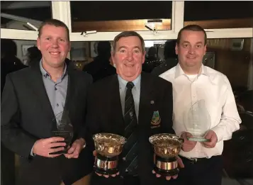  ??  ?? Scotch Foursomes winners Brian Foley and Garreth Whelan with Baltinglas­s Golf Club Captain John Kelly at the Baltinglas­s GC Captain’s Dinner and awards night.