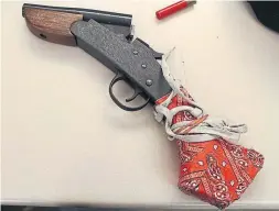  ?? TORONTO POLICE SERVICES ?? A loaded .410 gauge sawed-off shotgun was seized in a police raid on Saturday.