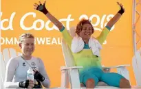  ?? PHOTO: GETTY IMAGES ?? Linda Villumsen, left, manages a smile but Katrin Garfoot is clearly the happier after the Australian won the time trial.