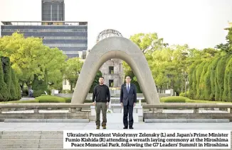  ?? ?? Ukraine’s President Volodymyr Zelensky (L) and Japan’s Prime Minister Fumio Kishida (R) attending a wreath laying ceremony at the Hiroshima Peace Memorial Park, following the G7 Leaders’ Summit in Hiroshima