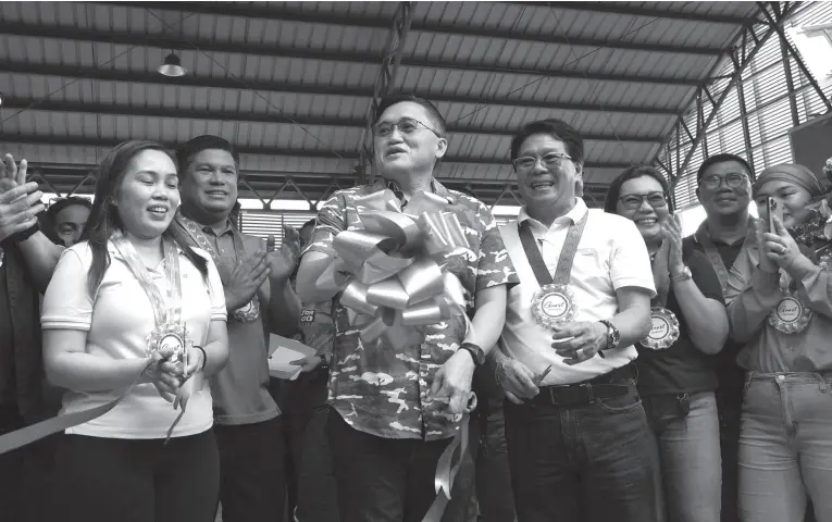  ?? BING GONZALES ?? SENATOR Christophe­r Lawrence “Bong” Go leads the inaugurati­on of one of two multi-purpose halls of Barangay Sasa during his visit on Thursday, Feb. 29, 2024. Sen. Go also turned over one multi-purpose vehicle and one mini dump truck.