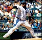  ??  ?? STABLE CC: New York Yankees starting pitcher CC Sabathia pitches during the second inning against the Detroit Tigers Sunday at Yankee Stadium in New York. Sabathia threw eight solid innings, leading the Yankees to a 6- 2 victory in a rematch of last...