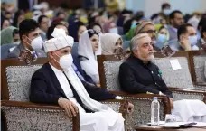  ?? AFP ?? President Ashraf Ghani, left, and Abdullah Abdullah, chairman of the High Council for National Reconcilia­tion, at the loya jirga