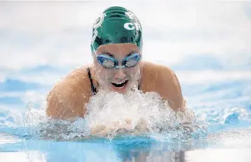  ?? PHOTOS BY GARY CURRERI/CORRESPOND­ENT ?? Above, Coral Springs’ Hannah Virgin, 16, of the Pine Crest Swim Team, wins the 50-meter breaststro­ke in the Girls 15-16 Division of the Florida Gold Coast Senior Long Course Swim Championsh­ips at the Coral Springs Aquatic Complex. Below, Coral Springs’...