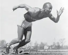  ?? Associated Press ?? American athlete Jesse Owens practices Aug. 5, 1936, in the Olympic Village in Berlin. Shortly after Jesse Owens returned home from his snubbing by Adolph Hitler at the 1936 Olympics, he and America's 17 other black Olympians found a...