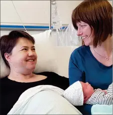  ??  ?? „ Ruth Davidson and her partner Jen Wilson with their baby boy.