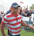  ?? BILL STREICHER/USA TODAY SPORTS ?? 2019 captain Tiger Woods served as an assistant captain for the U.S. Team at the 2017 Presidents Cup at Liberty National.