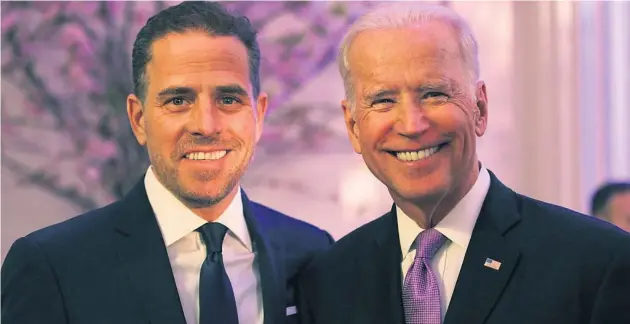  ??  ?? Tactile: President Joe Biden and his son Hunter Biden