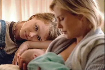  ?? IMAGES CONTRIBUTE­D BY ATLANTA FILM FESTIVAL ?? Mackenzie Davis (left) and Charlize Theron star in the bitterswee­t comedy “Tully.”