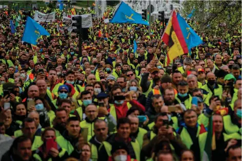  ?? (AP Photo/Manu Fernandez) ?? FILE - Truck drivers protest against the high price of fuel in Madrid, Spain, on March 25, 2022. As food costs and fuel bills soar, inflation is plundering people’s wallets, sparking a wave of protests and workers’ strikes around the world.