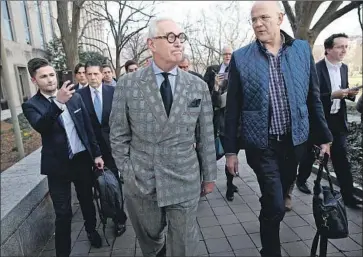 ?? Win McNamee Getty Images ?? ROGER STONE leaves the federal courthouse in Washington on Thursday after his trial date was scheduled.
