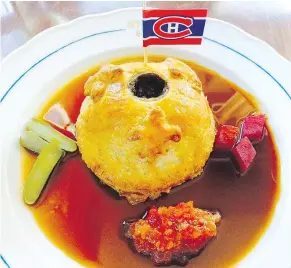  ??  ?? Tourtiere at St. Lawrence is topped with a tiny Canadiens flag.