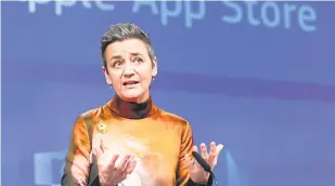  ?? AP ?? EU’s competitio­n commission­er Margrethe Vestager addresses the media at EU headquarte­rs in Brussels on Monday.