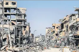 ?? AFP ?? Heavily damaged buildings in Raqqa, after the Islamic State was expelled from the Syrian city.
