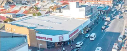  ??  ?? THIS busy Shoprite supermarke­t in Victoria Road, Woodstock, is one of five small non-core retail centres that Shoprite will auction in the Western Cape.