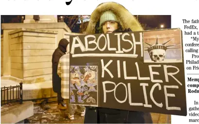  ?? KAMIL KRZACZYNSK­I/AGENCE FRANCE-PRESSE ?? PROTESTER holds a sign during a rally against the fatal police assault of Tyre Nichols, in the Pilsen neighborho­od of Chicago.