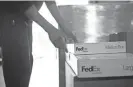  ?? PROVIDED ?? Some Fedex boxes in Alabama did not get the typical delivery treatment.