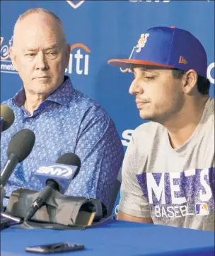  ?? Anthony J. Causi ?? WELCOME ABOARD: Mets general manager Sandy Alderson looks on during a press conference introducin­g pitcher Jason Vargas, who signed a two-year, $16 million deal. Vargas was 18-11 with a 4.16 ERA with the Royals in 2017.