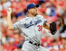  ?? AARON DOSTER / AP ?? Los Angeles’ Max Scherzer throws Saturday in Cincinnati, where he pitched seven scoreless innings, gave up only two hits and racked up seven strikeouts. His ERA is now 2.08.