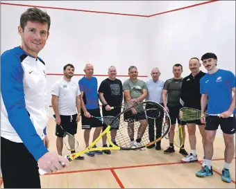  ?? Photograph: Iain Ferguson, alba.photos. ?? Scotland’s number one squash player Greg Lobban, left, with number five John Meehan spent a day coaching members of Lochaber Squash Club.