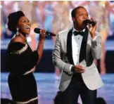  ??  ?? Cynthia Erivo, left, and Leslie Odom, Jr. perform "New York, New York" with the Rockettes.