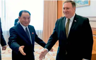  ?? AFP ?? Mike Pompeo and Kim Yong-chol arrive for a lunch at the Park Hwa Guest House in Pyongyang. —