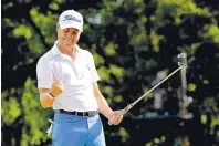  ?? NAM Y. HUH/ASSOCIATED PRESS ?? Justin Thomas celebrates after making a birdie on the 18th green during the final round of the BWM Championsh­ip at Medinah Country Club on Sunday. Thomas won by 3 shots.