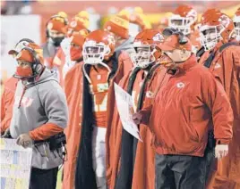  ?? REED HOFFMANN/AP ?? Chiefs players know coach Andy Reid, right, will stand by them even if they’re struggling or have made a critical in-game mistake.