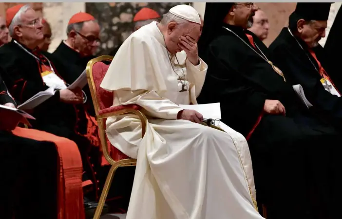  ?? —AFP ?? CLERICAL ‘ATROCITY’ Pope Francis, who appears to be in deep prayer during Saturday’s liturgical prayer, on Sunday ends the landmark Vatican summit on clergy abuse by vowing to confront abusers with “utmost seriousnes­s.”