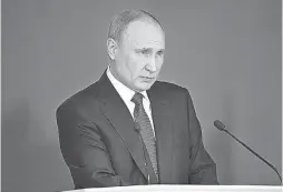  ??  ?? Russian President Vladimir Putin delivers his annual address to the Federal Assembly in Moscow on March 1.