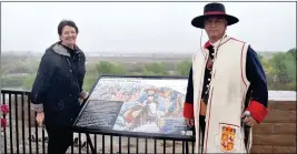  ??  ?? YUMA CROSSING NATIONAL HERITAGE AREA historian/archaeolog­ist and curator Tina Clark (left) and Dennis Carlos stand next to the waymarker.