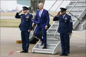  ?? AP PHOTO/CAROLYN KASTER ?? President Joe Biden arrives on Air Force One at Des Moines Internatio­nal Airport, in Des Moines Iowa, Tuesday, April 12, 2022, en route to Menlo, Iowa.