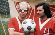  ??  ?? Diamond delight Elton may have never been to Airdrie, but this photo submitted by Airdrieoni­ans commercial manager Dougy Allsop sees the musical star sporting a Diamonds-style kit as he trains with the legendary George Best during the Irishman’s spell...