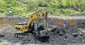  ?? /Reuters ?? Digging in: An excavator at work at the bottom of Congolese state mining company Gecamines’s Kamfundwa open pit copper mine.