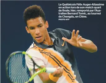  ?? PHOTO AFP ?? Le Québécois Félix Auger-aliassime en action lors de son match quart de finale, hier, remporté par l’australien Bernard Tomic, au tournoi de Chengdu, en Chine.