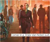  ??  ?? Comer in a Dries Van Noten suit.