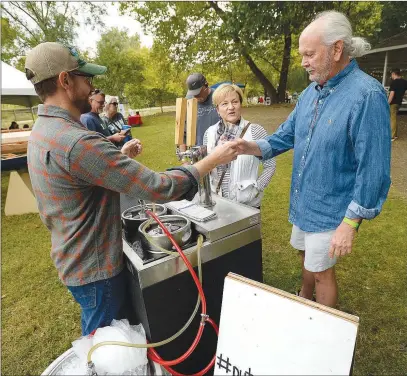  ?? ?? The Downtown Springdale festival Ozarktober runs all month and offers a plethora of events that run the gamut from an Art Walk to beer tastings from local craft breweries and live music at Turnbow Park.
(NWA Democrat-Gazette File Photo/Andy Shupe)