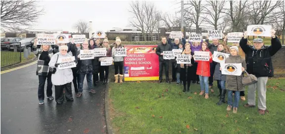  ??  ?? Anti-closure protesters at Ponteland Middle School in Northumber­land. Their campaign was successful, but there are fears the school won’t survive