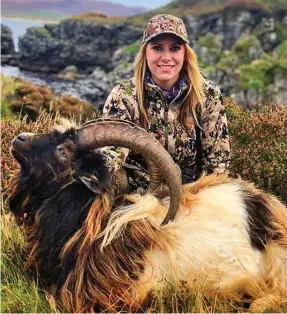  ??  ?? Blood lust: Larysa Switlyk shared this image of her with a shot goat
