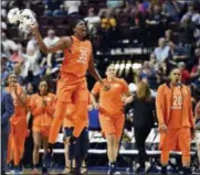  ?? SEAN D. ELLIOT/ THE DAY VIA AP - FILE ?? In this June 9, 2018, file photo, Connecticu­t Sun center Jonquel Jones (35) and guard Alex Bentley (20) come off the bench cheering as the Minnesota Lynx call a timeout to stop a Sun run in the first half of a WNBA basketball game, at Mohegan Sun Arena...