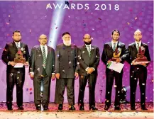  ??  ?? CEO Award recipients Nishath Nawaz of Operations Department, Chandana Dissanayak­e of Central Processing Unit and Zakir Hisham of Prestige Banking Unit along with Amãna Bank Chairman Osman Kassim, Deputy Chairman Tyeab Akbrally and CEO Mohamed Azmeer