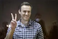  ?? Alexander Zemlianich­enko/Associated Press ?? Russian opposition leader Alexei Navalny discussed being forced to watch hours of state TV daily, a program that has replaced hard labor for political prisoners.