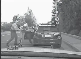  ?? MCMANIS-FAULKNER ?? Santa Clara County sheriff’s Deputy Daniel Forest, left, is shown in a dashcam video arresting Shiow-Huey Chang during a traffic stop on June 11, 2014. Chang filed a civil rights lawsuit that alleged she was pulled out of her car after refusing to sign...